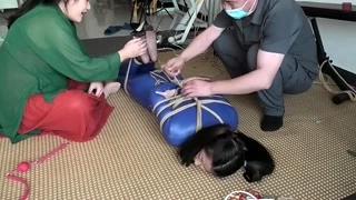 Bound in rubber zentai fucking in both holes