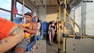Bizarre deep kissing on the bus